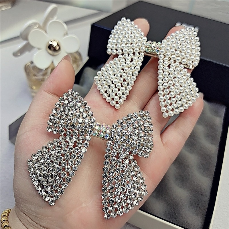 Body Jewelry Wholesale - حجر الراين اللؤلؤ القوس مقاطع الشعر