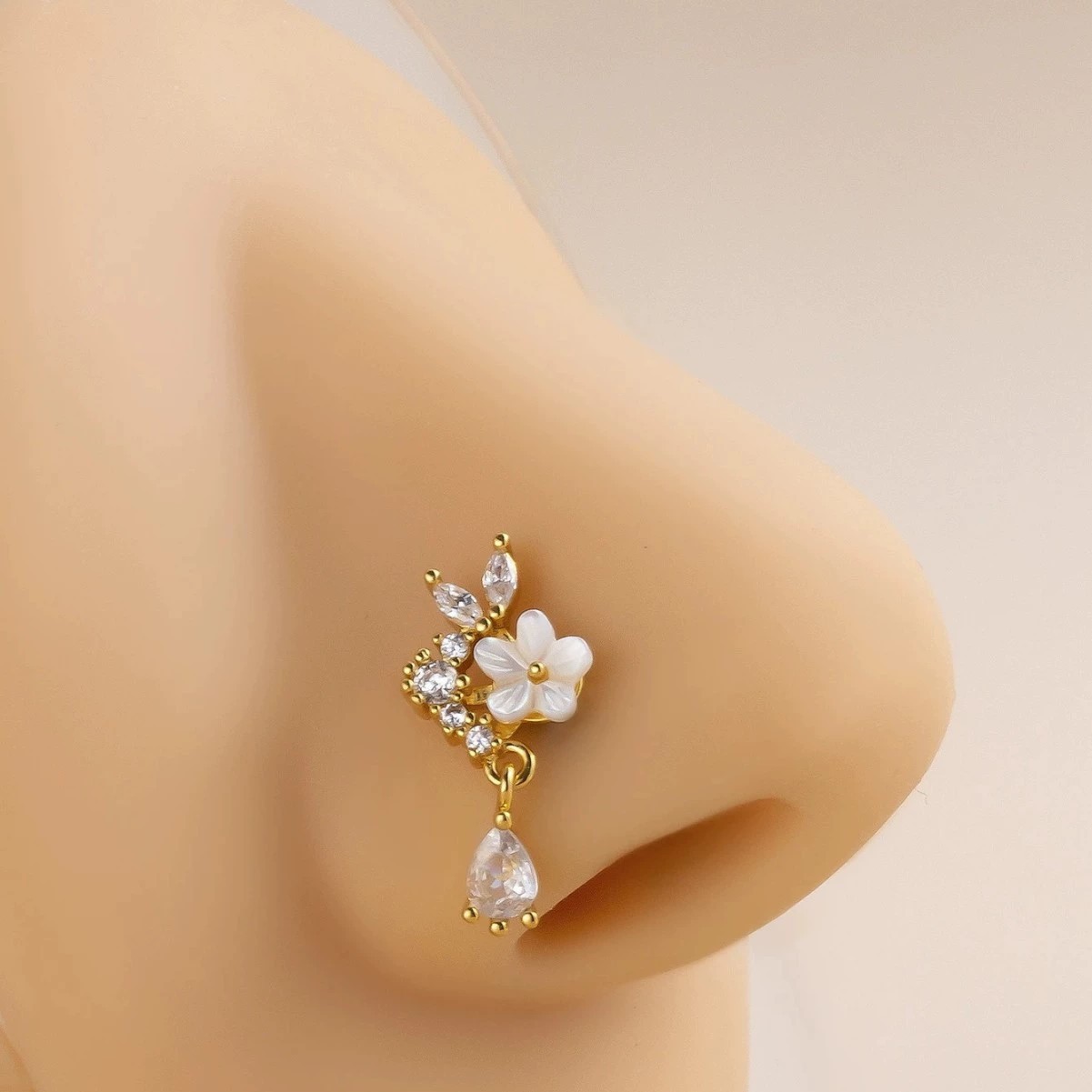 حلقة أنف ذهبية على شكل زهرة مع - مراجعة Body Jewelry Nose وسعره