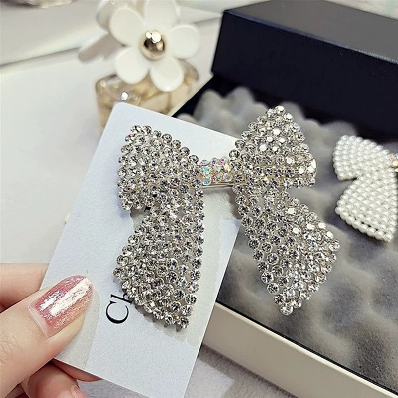 حجر الراين اللؤلؤ القوس مقاطع  - مراجعة Body Jewelry Wholesale وسعره
