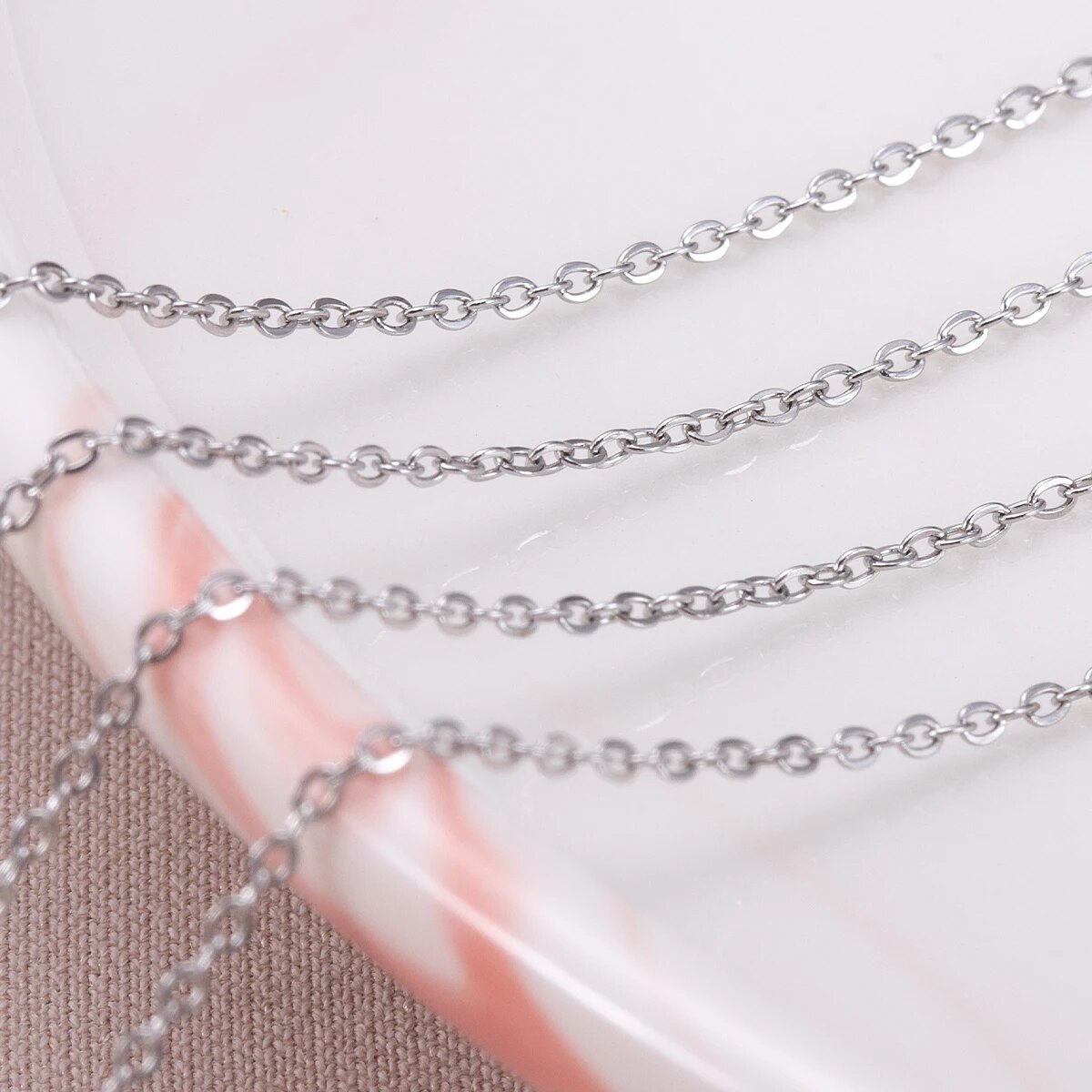 سلاسل رفيعة على شكل حرف O من ا - مراجعة Body Jewelry Usa وسعره